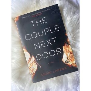 THE COUPLE NEXT DOOR by Shari Lapena [Paperback]